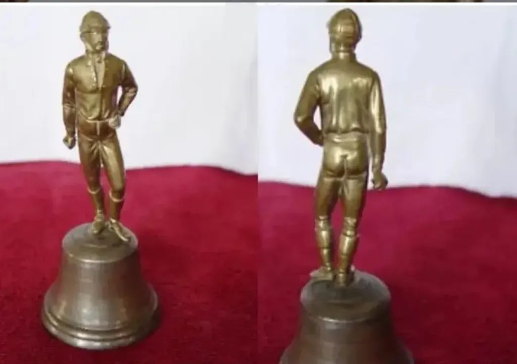 Brass Bell with Man as Handle Decor